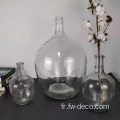 Effacer de grands vases de bouteille en verre ronds